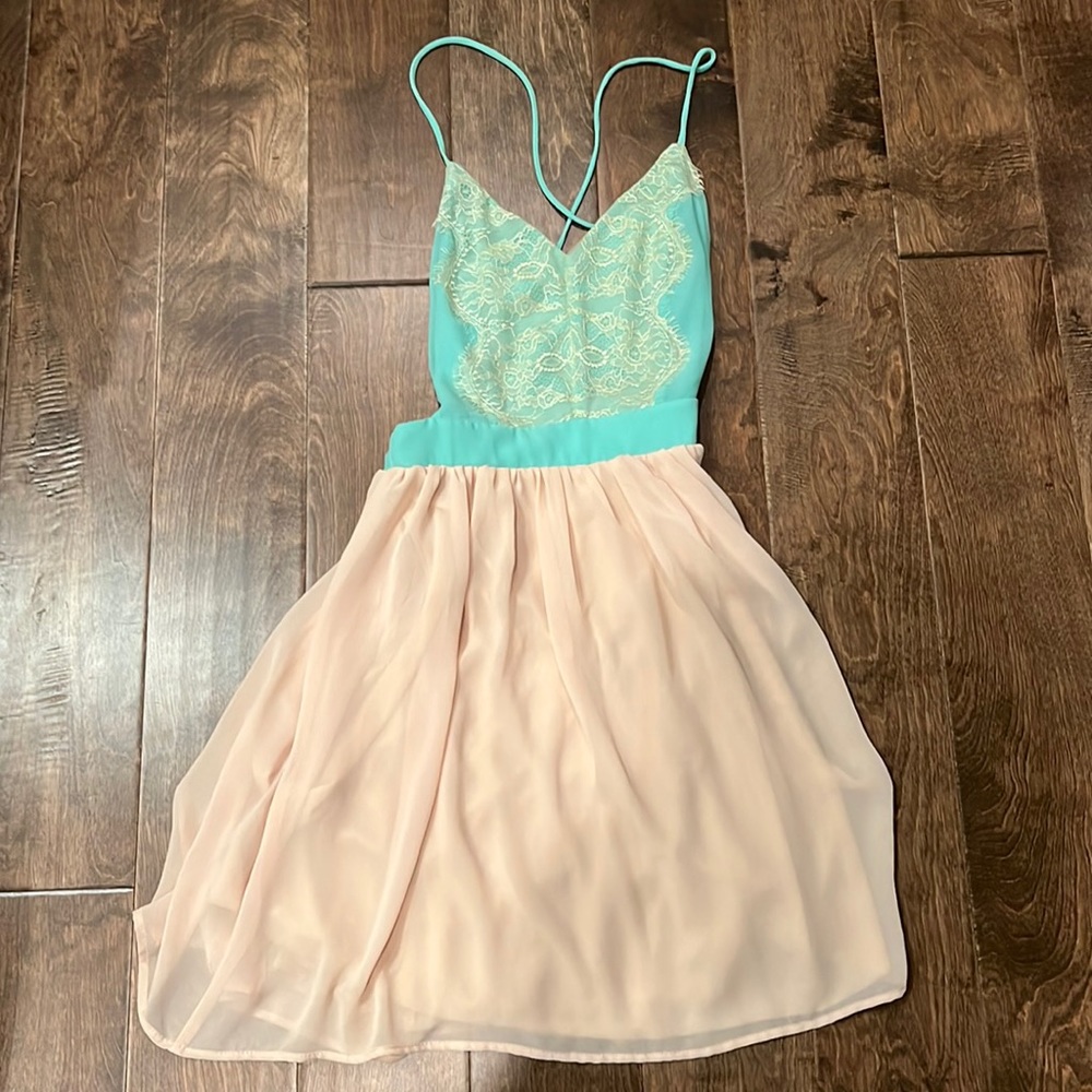 Backless dress, aqua and cream